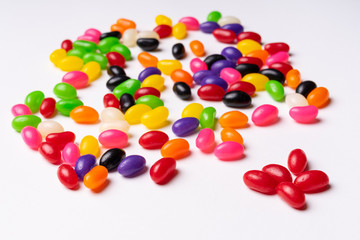 colorful jelly beans candies white background Top view