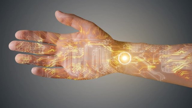 Futuristic hand using high technology and electronics