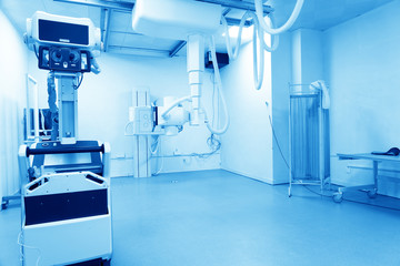 X-ray machine with control panel and scanning screen in modern clinics