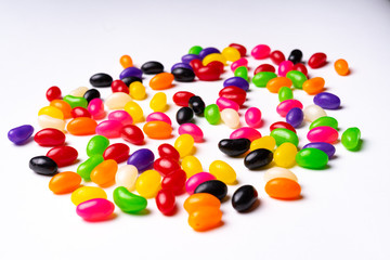 colorful jelly beans candies white background Top view