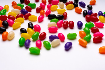 colorful jelly beans candies white background Top view