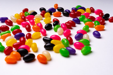 colorful jelly beans candies white background Top view
