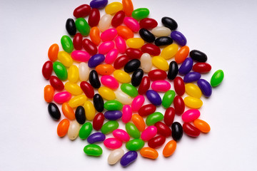colorful jelly beans candies white background Top view