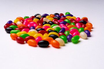 colorful jelly beans candies white background Top view