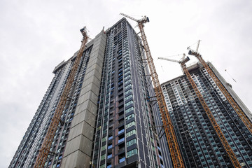 Fototapeta premium Construction site modern high rise condominium building