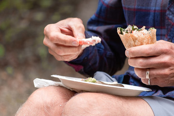 hands of woman with food for lunch