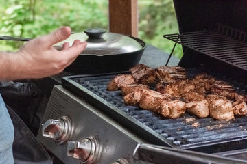 Yummy meat on the grill in the garden