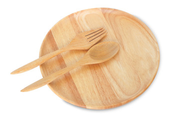 Round wood plate with spoon and fork isolate on white background