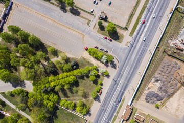 aerial top view of industrial district. parking near manufacturing company