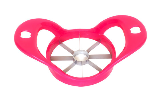 Pink plastic of apple slicer cutter isolate on white background