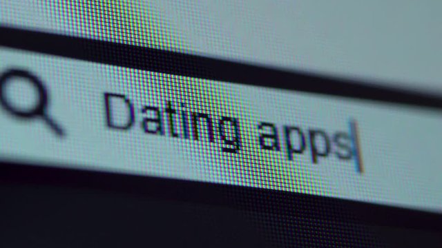 Browser bar with Dating Apps text typed on the computer monitor. Shot in 4k resolution
