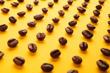 coffee beans on yellow background