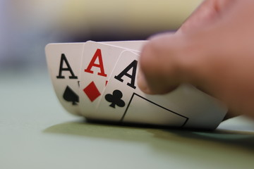 A beautiful view of three of a kind poker cards