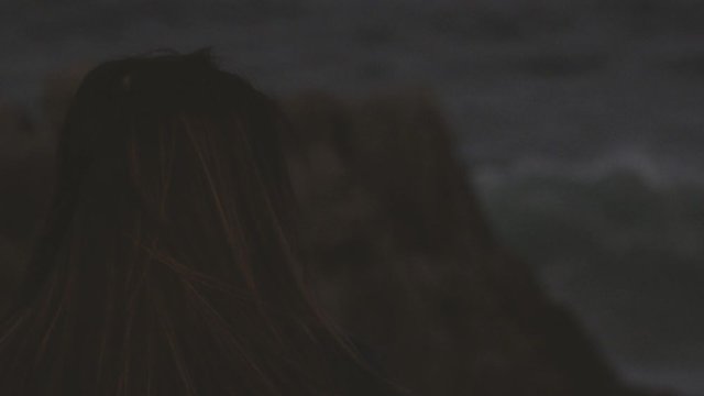 silhouette of a woman on black background