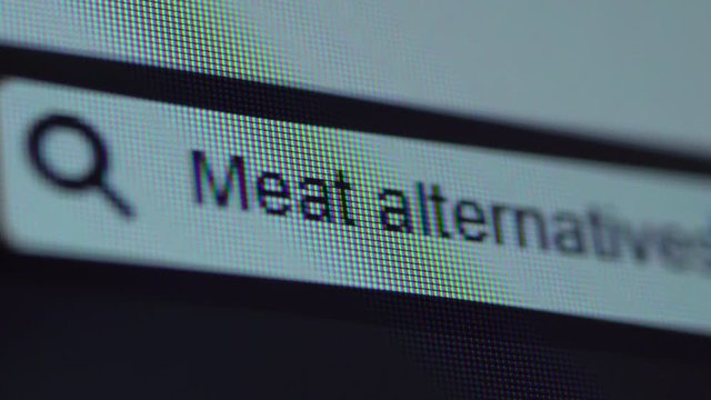 Browser bar with Meat Alternatives text typed on the computer screen. Shot in 4k resolution