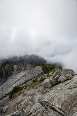 Beautiful View of Canadian Mountain Landscape during a cloudy summer morning. Taken on Crown Mountain, North Vancouver, British Columbia, Canada.