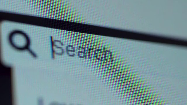 Empty browser bar with Search word on the computer screen. Shot in 4k resolution