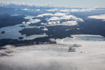 Aerial view of beautiful Beach on the Pacific Ocean Coast during a sunny summer morning. Taken in Tofino, Vancouver Island, British Columbia, Canada.