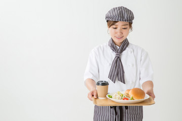 コックコートを着た女性