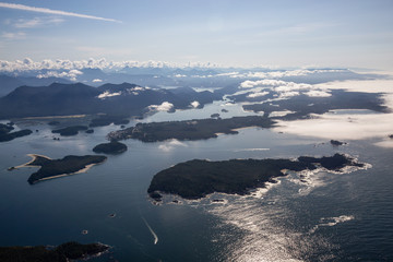 Aerial Landscape View of a touristic town, Tofino, on the Pacific Ocean Coast during a sunny summer morning. Taken in Vancouver Island, British Columbia, Canada.
