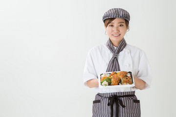 コックコートを着た女性