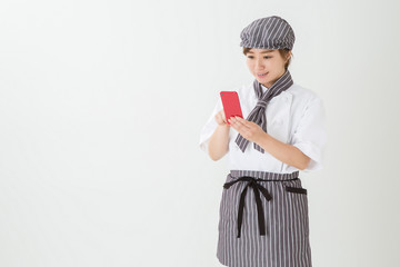 コックコートを着た女性