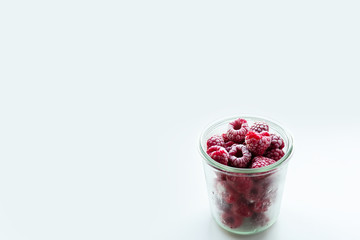 Frozen Raspberries in a Glass