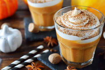 Pumpkin latte decorated whipped cream