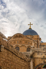Fototapeta na wymiar View from Via Dolorosa to dome on Church of the Holy Sepulchre in Jerusalem