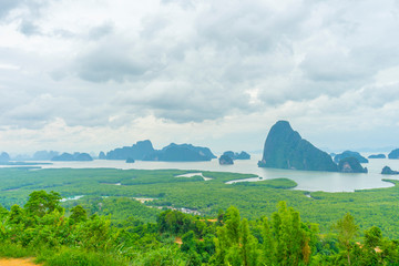 Unidentified people sightseeing at Samet Nang She point looking through Phang Nga Bay in Phang Nga, Thailand