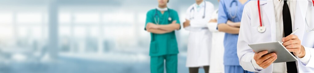 Healthcare people group. Professional doctor working in hospital office or clinic with other...