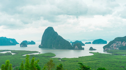 Unidentified people sightseeing at Samet Nang She point looking through Phang Nga Bay in Phang Nga,...