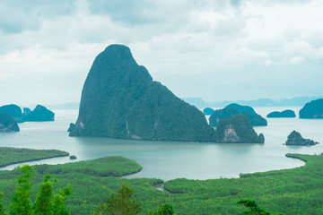Unidentified people sightseeing at Samet Nang She point looking through Phang Nga Bay in Phang Nga, Thailand