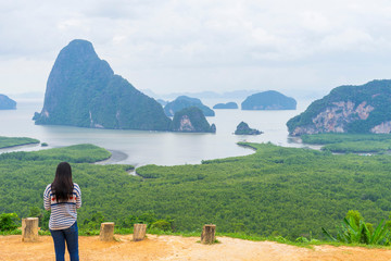 Unidentified people sightseeing at Samet Nang She point looking through Phang Nga Bay in Phang Nga,...