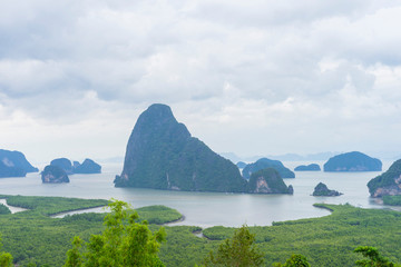 Unidentified people sightseeing at Samet Nang She point looking through Phang Nga Bay in Phang Nga, Thailand