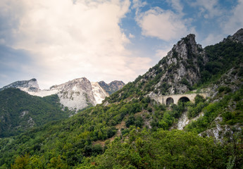 Fototapeta na wymiar View of approach to the marble quarries in the Apuan Alps mountains, near Carrara, Italy. Famous for white marble, but also popular with tourists.