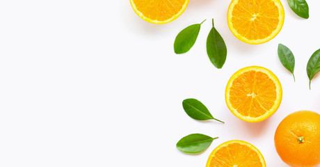 Fresh orange citrus fruit with leaves isolated on white background.