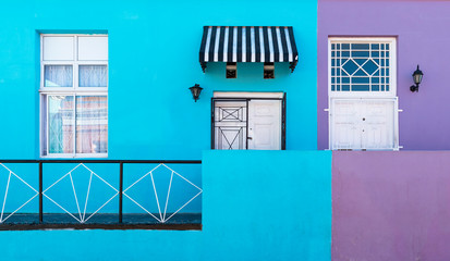 Purple and blue facade with doors and windows in the colorful malay district of Bo Kaap in Cape Town, Western Cape province, South Africa.