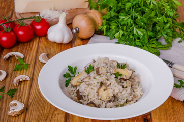 Risotto with mushrooms, fresh herbs and parmesan cheese.