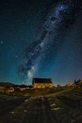 Fototapeta na wymiar Backgrounds night sky with stars and milky way over the church at tekapo lake south island new zealand