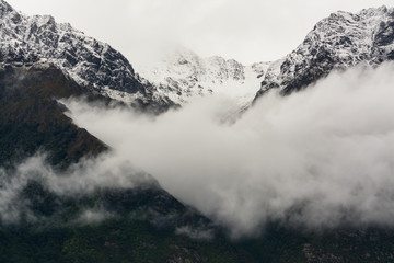 fog on the mountains in the winter at south island newzealand