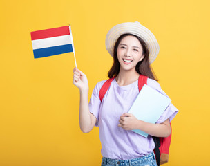Young asian girl  student showing the Netherlands  flag