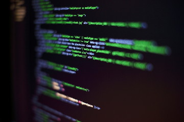 Programmer workplace. Big data storage and cloud computing representation. Programming code. Website development. Web site codes on computer monitor. Abstract screen of software. Computer script.