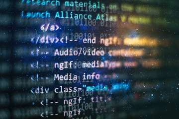 Programmer workplace. Big data storage and cloud computing representation. Programming code. Website development. Web site codes on computer monitor. Abstract screen of software. Computer script.