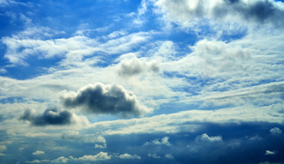 Fototapeta premium white thunderclouds floating across the sky