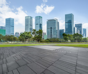Panoramic skyline and buildings with empty square floor.