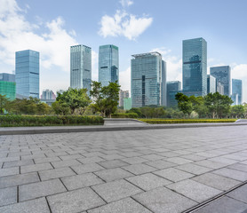 Panoramic skyline and buildings with empty square floor.
