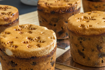 closeup view christmas mini cakes on wooden board
