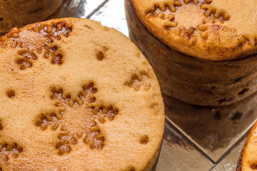 closeup view christmas mini cakes on wooden board