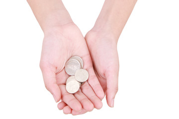 Coin holding in girl hands. ISOLATED on WHITE BACKGROUND.